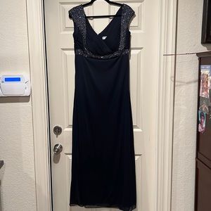 Evening wear. Dark navy blue dress
